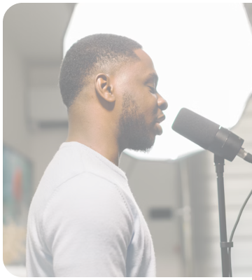 Man speaking into microphone