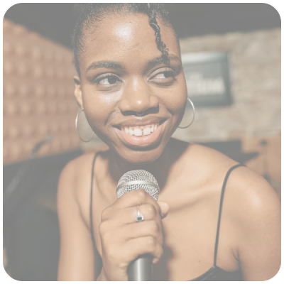 Young woman smiling with microphone